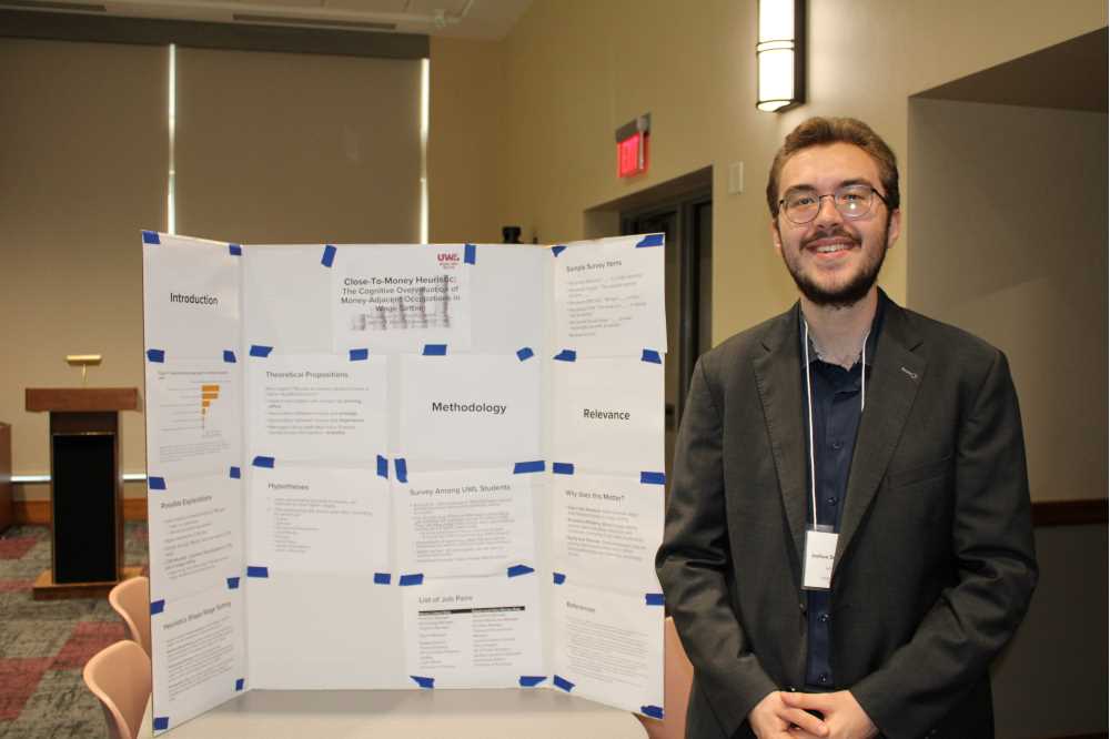 Joshua Rosendorn presenting research poster
